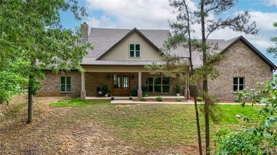 This beautifully crafted 4-bedroom, 3.5-bath brick estate sits - photo 3