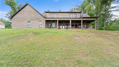 This beautifully crafted 4-bedroom, 3.5-bath brick estate sits - photo 6