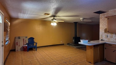 Fixer-Upper Opportunity! Welcome to a home full of potential in - photo 14