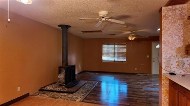Fixer-Upper Opportunity! Welcome to a home full of potential in - photo 15