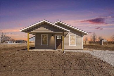 Come and check out this gorgeous new build located within a - Lake Home For Sale in Linn Valley, Kansas