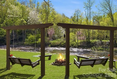RIVERFRONT home on 2.4 acres in Linville Falls, where the sound - photo 8