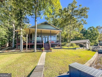 Tranquility on Tussahaw- Deeded Rebuilt Home amidst Lush Greenery - Lake Home For Sale in Jackson, Georgia