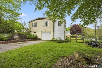 Waterfront escape on the Yantic River. This beautifully updated - photo 1