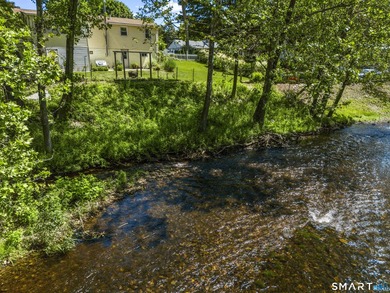 Waterfront escape on the Yantic River. This beautifully updated - photo 4