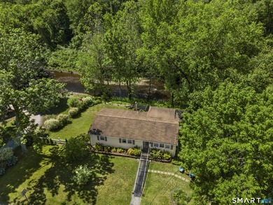 Waterfront escape on the Yantic River. This beautifully updated - photo 6