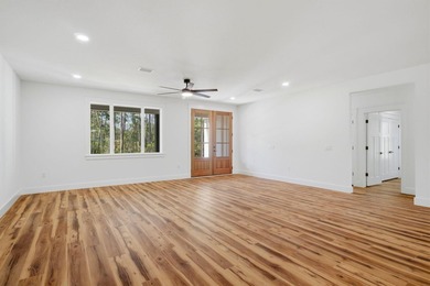 Welcome to 8756 Sand Pine Drive--a truly rare new-construction - photo 11