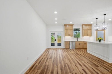 Welcome to 8756 Sand Pine Drive--a truly rare new-construction - photo 15