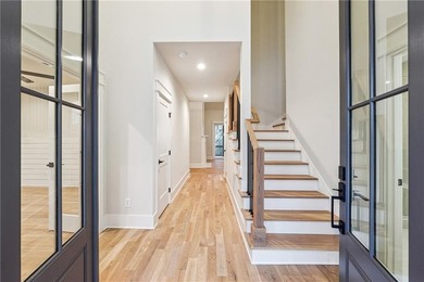 Experience elevated Lake Lanier living in this exceptional new - photo 10