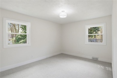 MOVE IN READY 3-bedroom, 1.5-bath ranch with a 1-car garage and - photo 11