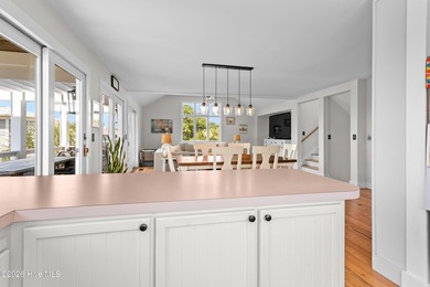 Set on one of Wrightsville Beach's most coveted streets in the - photo 12