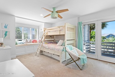 Set on one of Wrightsville Beach's most coveted streets in the - photo 29
