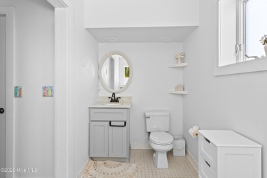 Set on one of Wrightsville Beach's most coveted streets in the - photo 31