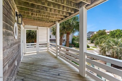 Set on one of Wrightsville Beach's most coveted streets in the - photo 37