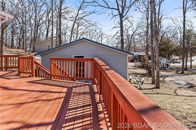 Newer metal roof, gutters & downspouts, newer vinyl siding - photo 40