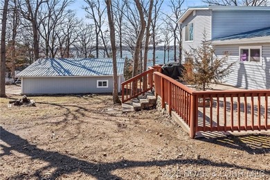 Newer metal roof, gutters & downspouts, newer vinyl siding - photo 43