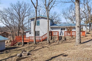 Newer metal roof, gutters & downspouts, newer vinyl siding - photo 45