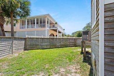 Set on one of Wrightsville Beach's most coveted streets in the - photo 46