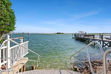 Set on one of Wrightsville Beach's most coveted streets in the - photo 49