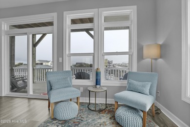 Experience stunning sound-side living in this well-maintained