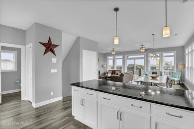 Experience stunning sound-side living in this well-maintained