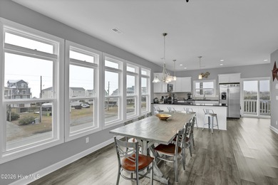 Experience stunning sound-side living in this well-maintained