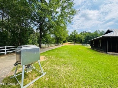 Hilltop Residence and new doublewide overlook a stocked lake and - photo 21