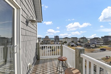 Experience stunning sound-side living in this well-maintained