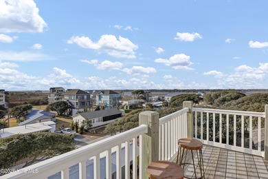 Experience stunning sound-side living in this well-maintained