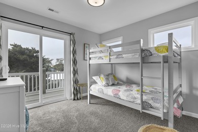 Experience stunning sound-side living in this well-maintained