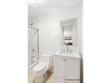 Welcome home to this sprawling Lenox Hill convertible - photo 9