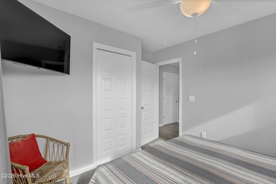 Experience stunning sound-side living in this well-maintained