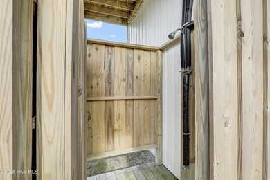 Experience stunning sound-side living in this well-maintained