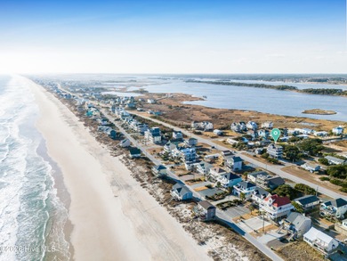 Experience stunning sound-side living in this well-maintained