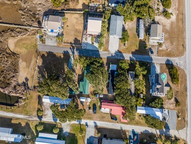 Experience stunning sound-side living in this well-maintained