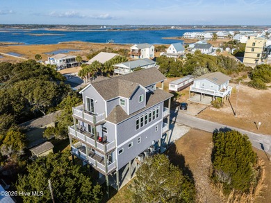 Experience stunning sound-side living in this well-maintained