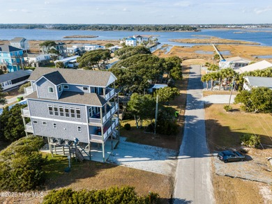 Experience stunning sound-side living in this well-maintained