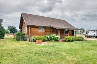 Discover the timeless appeal of this charming 1970's log cabin - photo 3