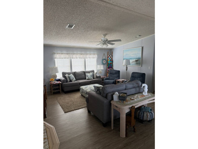 Beautiful furnished lake view home!! This 3 bedroom, 2 bath home - photo 3