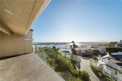 Perched on the coveted Corona del Mar bluff, this exceptional - photo 16