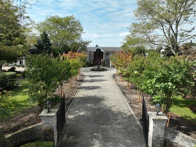 Privately gated, prestigious waterfront home in the heart of - photo 3