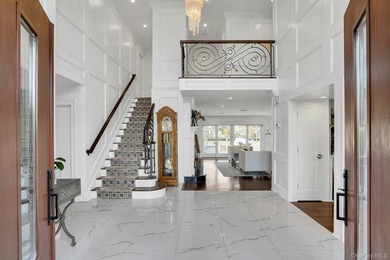 Privately gated, prestigious waterfront home in the heart of - photo 9
