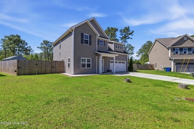 Nestled on nearly an acre in the peaceful cul-de-sac community - photo 3