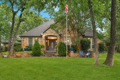 Beautifully situated on a heavily treed one-acre lot in the - photo 2