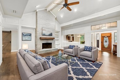 Beautifully situated on a heavily treed one-acre lot in the - photo 3