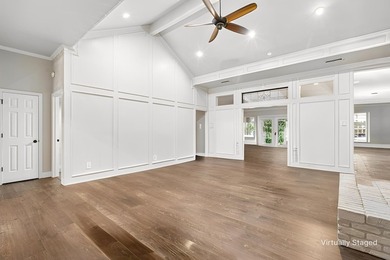 Beautifully situated on a heavily treed one-acre lot in the - photo 4