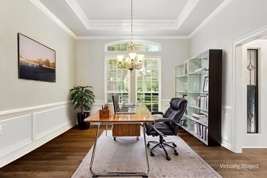 Beautifully situated on a heavily treed one-acre lot in the - photo 6
