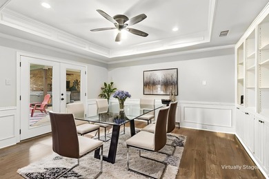 Beautifully situated on a heavily treed one-acre lot in the - photo 7