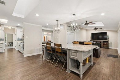 Beautifully situated on a heavily treed one-acre lot in the - photo 9