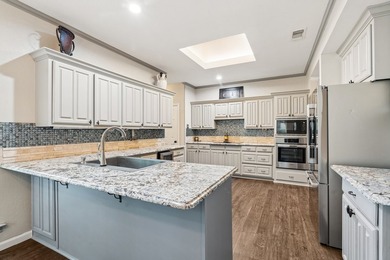 Beautifully situated on a heavily treed one-acre lot in the - photo 10